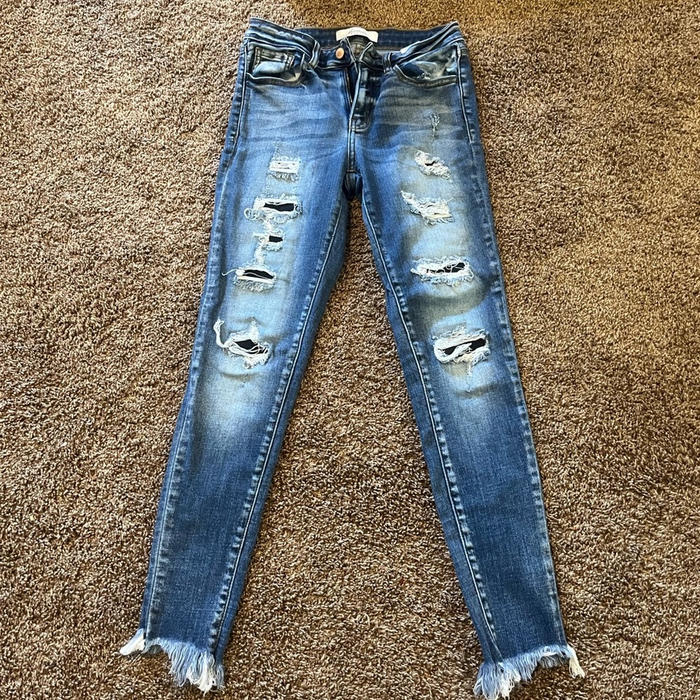Distressed Blue Jeans